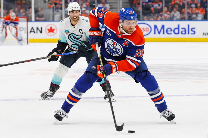 Sep 24, 2025; Edmonton, Alberta, CAN; Edmonton Oilers forward Leon Draisaitl (29) looks to make a pass in front of Seattle Kraken forward Jordan Eberle (7) during the third period at Rogers Place. Mandatory Credit: Perry Nelson-Imagn Images