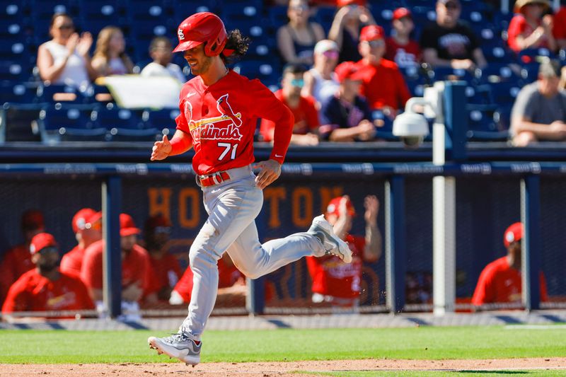 Feb 28, 2023; West Palm Beach, Florida, USA; St. Louis Cardinals infielder Kramer Robertson (71) scores a run during the fifth inning against the Washington Nationals at The Ballpark of the Palm Beaches. Mandatory Credit: Sam Navarro-USA TODAY Sports