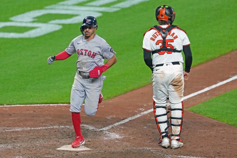 May 28, 2024; Baltimore, Maryland, USA; Boston Red Sox shortstop David Hamilton (70) scores on a sacrifice fly ball in the ninth inning against the Baltimore Orioles at Oriole Park at Camden Yards. Mandatory Credit: Mitch Stringer-USA TODAY Sports