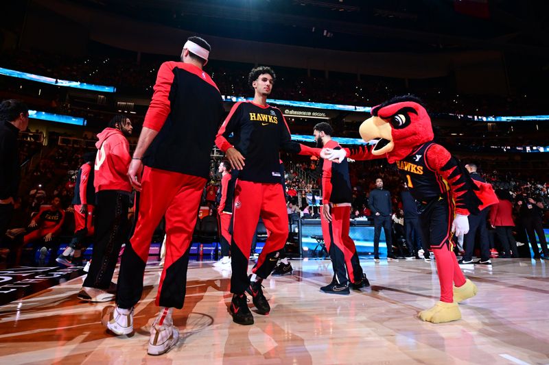 ATLANTA, GA - NOVEMBER 9: Zaccharie Risacher #10 of the Atlanta Hawks is introduced before the game against the Chicago Bulls on November 9, 2024 at State Farm Arena in Atlanta, Georgia.  NOTE TO USER: User expressly acknowledges and agrees that, by downloading and/or using this Photograph, user is consenting to the terms and conditions of the Getty Images License Agreement. Mandatory Copyright Notice: Copyright 2024 NBAE (Photo by Adam Hagy/NBAE via Getty Images)