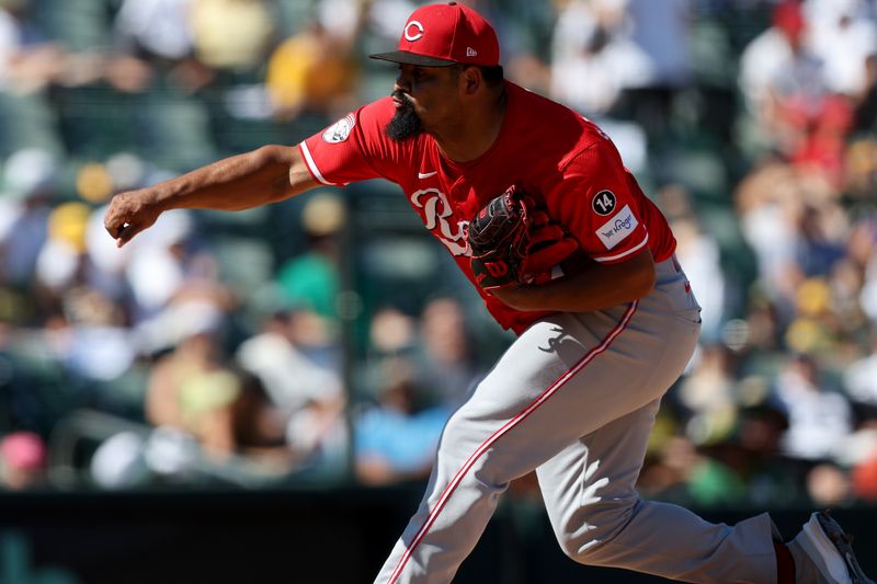 Sep 14, 2025; West Sacramento, California, USA; Cincinnati Reds pitcher Tony Santillan (64) throws a pitch against the Athletics during the sixth inning at Sutter Health Park. Mandatory Credit: Dennis Lee-Imagn Images