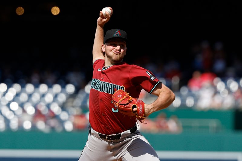 Jun 19, 2024; Washington, District of Columbia, USA; Arizona Diamondbacks starting pitcher Brandon Pfaadt (32) pitches against the Washington Nationals during the first inning at Nationals Park. Mandatory Credit: Geoff Burke-USA TODAY Sports