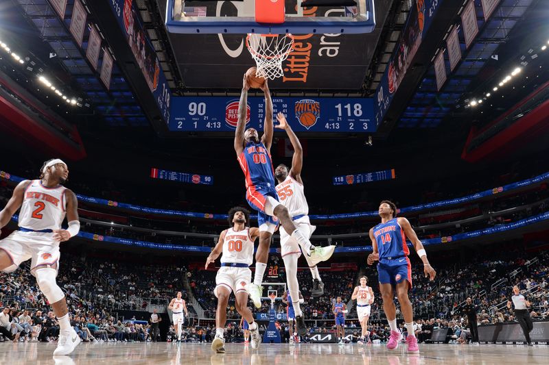 DETROIT, MI - NOVEMBER 1: Ron Holland II #00 of the Detroit Pistons dunks the ball during the game against the New York Knicks on November 1, 2024 at Little Caesars Arena in Detroit, Michigan. NOTE TO USER: User expressly acknowledges and agrees that, by downloading and/or using this photograph, User is consenting to the terms and conditions of the Getty Images License Agreement. Mandatory Copyright Notice: Copyright 2024 NBAE (Photo by Chris Schwegler/NBAE via Getty Images)