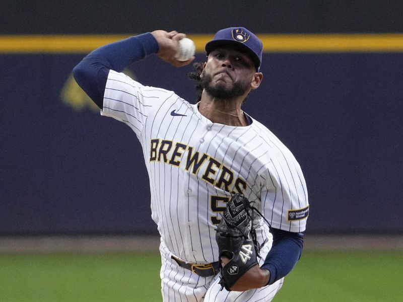 May 4, 2025; Milwaukee, Wisconsin, USA; Milwaukee Brewers pitcher Freddy Peralta (51) delivers a pitch against the Chicago Cubs in the first inning at American Family Field. Mandatory Credit: Michael McLoone-Imagn Images