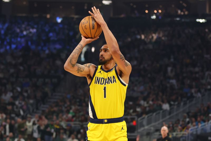 MILWAUKEE, WISCONSIN - APRIL 21: Obi Toppin #1 of the Indiana Pacers takes a three point shot against the Milwaukee Bucks during the first half of game one of the Eastern Conference First Round Playoffs at Fiserv Forum on April 21, 2024 in Milwaukee, Wisconsin.  NOTE TO USER: User expressly acknowledges and agrees that, by downloading and or using this photograph, User is consenting to the terms and conditions of the Getty Images License Agreement. (Photo by Stacy Revere/Getty Images)