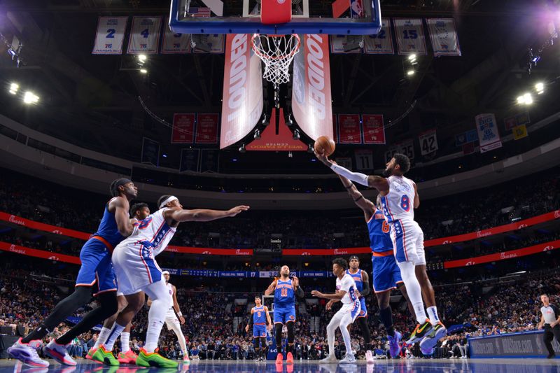 PHILADELPHIA, PA - JANUARY 15: Paul George #8 of the Philadelphia 76ers goes up for the rebound during the game against the New York Knicks on January 15, 2025 at the Wells Fargo Center in Philadelphia, Pennsylvania NOTE TO USER: User expressly acknowledges and agrees that, by downloading and/or using this Photograph, user is consenting to the terms and conditions of the Getty Images License Agreement. Mandatory Copyright Notice: Copyright 2025 NBAE (Photo by Jesse D. Garrabrant/NBAE via Getty Images)