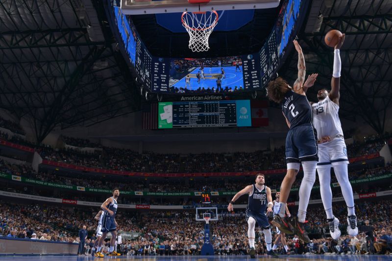 DALLAS, TX - DECEMBER 3: Jaren Jackson Jr. #13 of the Memphis Grizzlies drives to the basket during the game against the Dallas Mavericks during a Emirates NBA Cup game on December 3, 2024 at American Airlines Center in Dallas, Texas. NOTE TO USER: User expressly acknowledges and agrees that, by downloading and or using this photograph, User is consenting to the terms and conditions of the Getty Images License Agreement. Mandatory Copyright Notice: Copyright 2024 NBAE (Photo by Glenn James/NBAE via Getty Images)