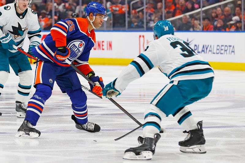 Apr 15, 2024; Edmonton, Alberta, CAN; Edmonton Oilers defensemen Darnell Nurse (25) takes a shot in front of San Jose Sharks defensemen Mario Ferraro (38) during the third period at Rogers Place. Mandatory Credit: Perry Nelson-USA TODAY Sports