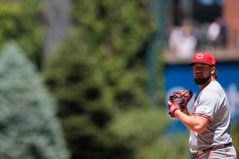 Jun 5, 2024; Denver, Colorado, USA; Cincinnati Reds starting pitcher Graham Ashcraft (51) delivers a pitch against the Colorado Rockies during the first inning at Coors Field. Mandatory Credit: Andrew Wevers-USA TODAY Sports