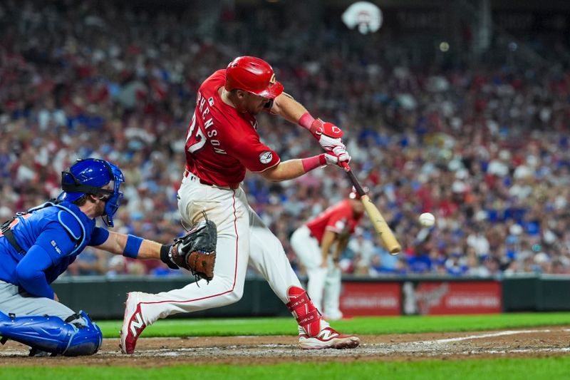 Sep 20, 2025; Cincinnati, Ohio, USA; Cincinnati Reds catcher Tyler Stephenson (37) hits a two-run home run against the Chicago Cubs in the eighth inning at Great American Ball Park. Mandatory Credit: Aaron Doster-Imagn Images