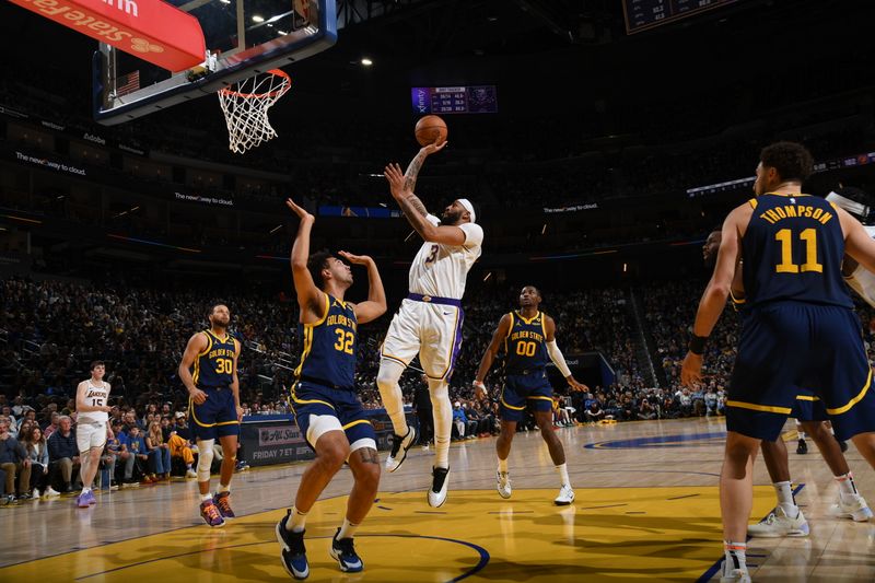 SAN FRANCISCO, CA - JANUARY 27: Anthony Davis #3 of the Los Angeles Lakers shoots the ball during the game  against the Golden State Warriors on January 27, 2024 at Chase Center in San Francisco, California. NOTE TO USER: User expressly acknowledges and agrees that, by downloading and or using this photograph, user is consenting to the terms and conditions of Getty Images License Agreement. Mandatory Copyright Notice: Copyright 2024 NBAE (Photo by Noah Graham/NBAE via Getty Images)