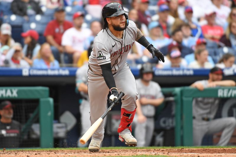 May 4, 2025; Philadelphia, Pennsylvania, USA; Arizona Arizona Diamondbacks catcher Jose Herrera (11) watches his two-run double during the fourth inning against the Philadelphia Phillies at Citizens Bank Park. Mandatory Credit: Eric Hartline-Imagn Images