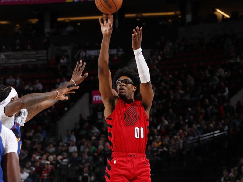 PORTLAND, OR - MARCH 23: Scoot Henderson #00 of the Portland Trail Blazers shoots the ball during the game against the Denver Nuggets on March 23, 2024 at the Moda Center Arena in Portland, Oregon. NOTE TO USER: User expressly acknowledges and agrees that, by downloading and or using this photograph, user is consenting to the terms and conditions of the Getty Images License Agreement. Mandatory Copyright Notice: Copyright 2024 NBAE (Photo by Cameron Browne/NBAE via Getty Images)