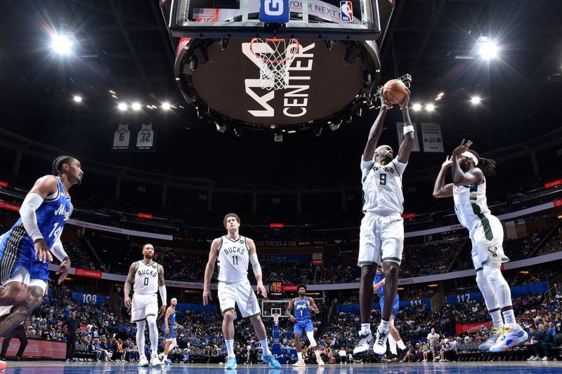 ORLANDO, FL - APRIL 14: Bobby Portis #9 of the Milwaukee Bucks grabs a rebound during the game against the Orlando Magic on April 14, 2024 at Kia Center in Orlando, Florida. NOTE TO USER: User expressly acknowledges and agrees that, by downloading and or using this photograph, User is consenting to the terms and conditions of the Getty Images License Agreement. Mandatory Copyright Notice: Copyright 2024 NBAE (Photo by Fernando Medina/NBAE via Getty Images)