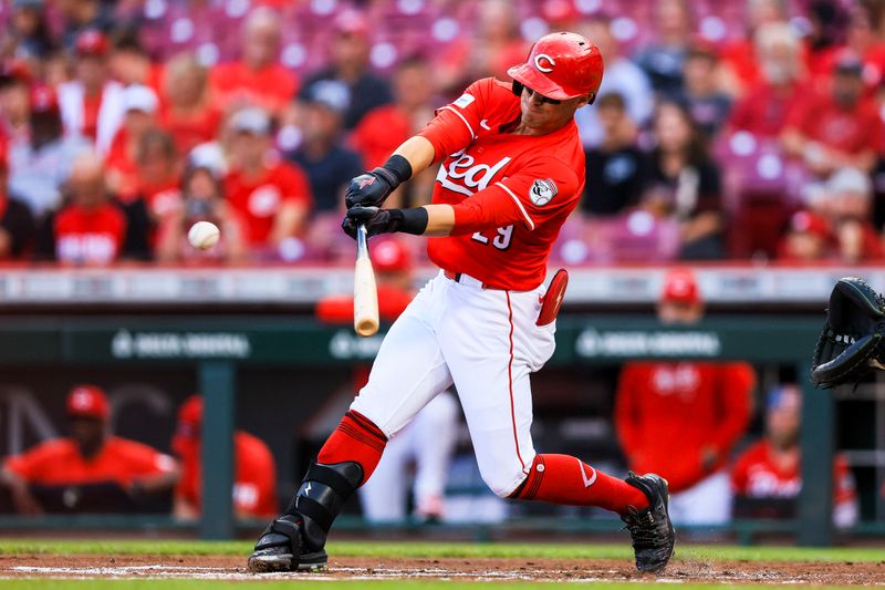 Sep 4, 2024; Cincinnati, Ohio, USA; Cincinnati Reds outfielder TJ Friedl (29) hits a RBI double in the first inning against the Houston Astros at Great American Ball Park. Mandatory Credit: Katie Stratman-Imagn Images