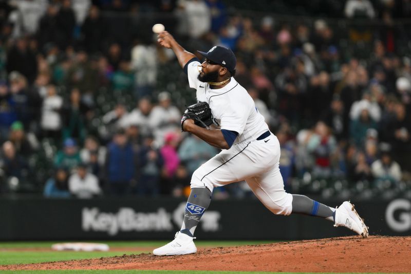 Apr 15, 2023; Seattle, Washington, USA; Seattle Mariners relief pitcher Diego Castillo pitches to the Colorado Rockies during the ninth inning at T-Mobile Park. Mandatory Credit: Steven Bisig-USA TODAY Sports