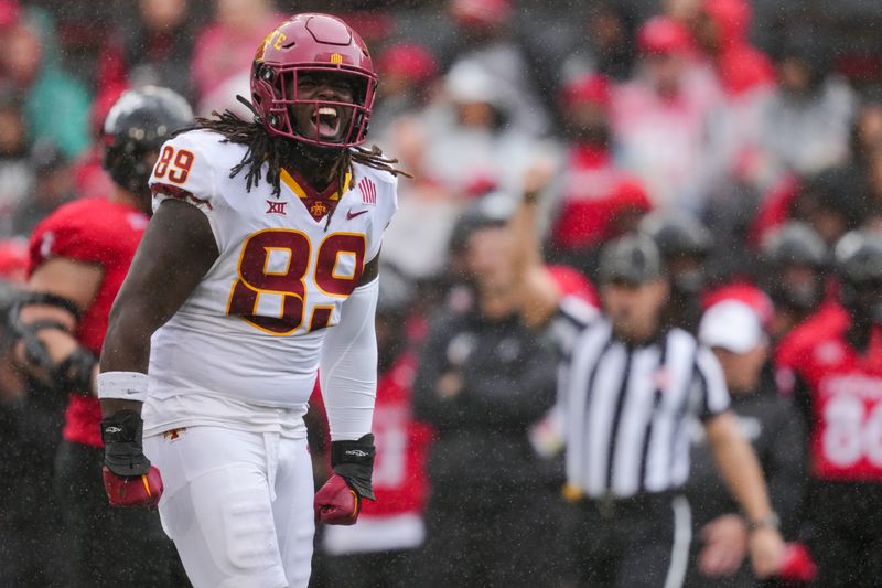 Oct 14, 2023; Cincinnati, Ohio, USA;  Iowa State Cyclones defensive end Trent Jones II (89) celebrates after tackling Cincinnati Bearcats quarterback Emory Jones (5) in the second half at Nippert Stadium. Mandatory Credit: Aaron Doster-USA TODAY Sports