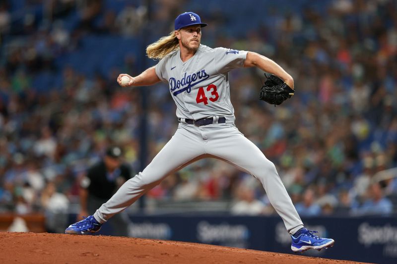 May 26, 2023; St. Petersburg, Florida, USA;  Los Angeles Dodgers starting pitcher Noah Syndergaard (43) throws a pitch against the Tampa Bay Rays in the first inning at Tropicana Field. Mandatory Credit: Nathan Ray Seebeck-USA TODAY Sports