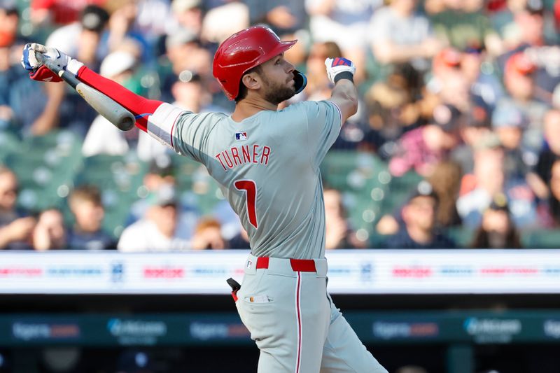 Jun 24, 2024; Detroit, Michigan, USA;  Philadelphia Phillies shortstop Trea Turner (7) hits a double in the first inning against the Detroit Tigers at Comerica Park. Mandatory Credit: Rick Osentoski-USA TODAY Sports