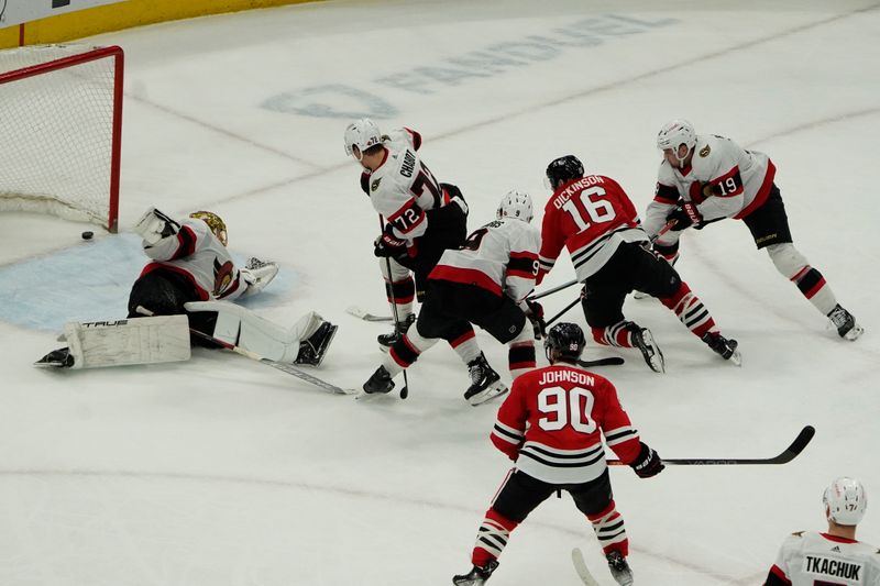 Feb 17, 2024; Chicago, Illinois, USA; Chicago Blackhawks center Jason Dickinson (16) scores the game winning goal on Ottawa Senators goaltender Joonas Korpisalo (70) during the third period at United Center. Mandatory Credit: David Banks-USA TODAY Sports