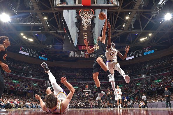 CLEVELAND, OH - NOVEMBER 25: Georges Niang #20 of the Cleveland Cavaliers drives to the basket during the game against the Los Angeles Lakers on November 25, 2023 at Rocket Mortgage FieldHouse in Cleveland, Ohio. NOTE TO USER: User expressly acknowledges and agrees that, by downloading and/or using this Photograph, user is consenting to the terms and conditions of the Getty Images License Agreement. Mandatory Copyright Notice: Copyright 2023 NBAE (Photo by David Liam Kyle/NBAE via Getty Images)