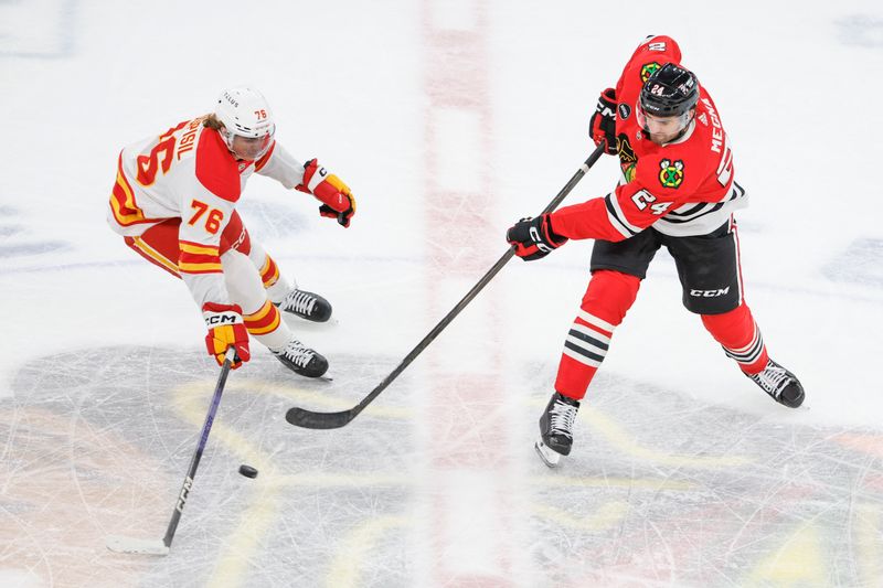 Mar 26, 2024; Chicago, Illinois, USA; Calgary Flames center Martin Pospisil (76) defends against Chicago Blackhawks defenseman Jaycob Megna (24) during the first period at United Center. Mandatory Credit: Kamil Krzaczynski-USA TODAY Sports