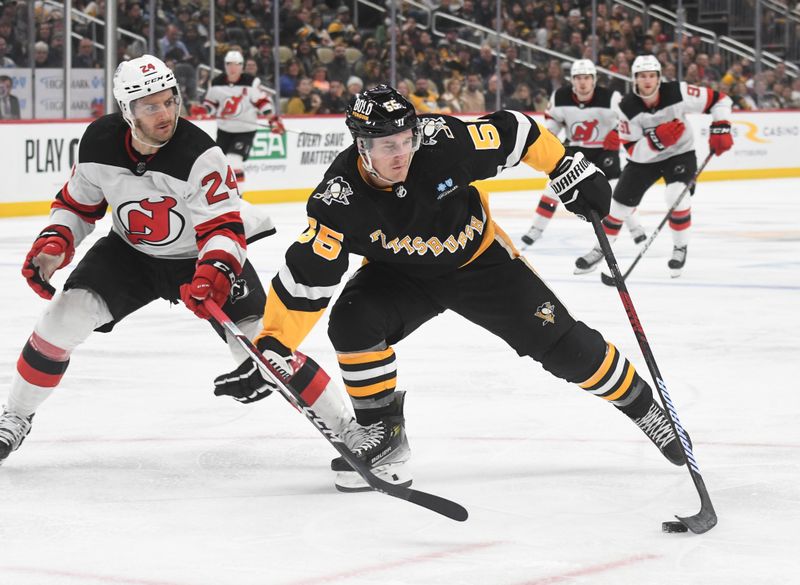 Nov 16, 2023; Pittsburgh, Pennsylvania, USA; Pittsburgh Penguins center Noel Acciari (55) keeps the puck from New Jersey Devils defenseman Colin Miller (24) during the third period at PPG Paints Arena. Mandatory Credit: Philip G. Pavely-USA TODAY Sports