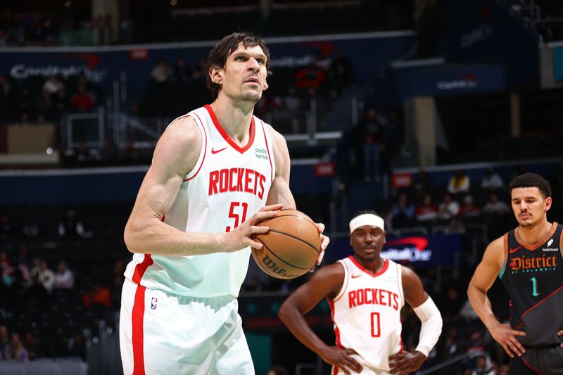 WASHINGTON, DC -? MARCH 19: Boban Marjanovic #51 of the Houston Rockets shoots a free throw during the game against the Washington Wizards on March 19, 2024 at Capital One Arena in Washington, DC. NOTE TO USER: User expressly acknowledges and agrees that, by downloading and or using this Photograph, user is consenting to the terms and conditions of the Getty Images License Agreement. Mandatory Copyright Notice: Copyright 2024 NBAE (Photo by Kenny Giarla/NBAE via Getty Images)