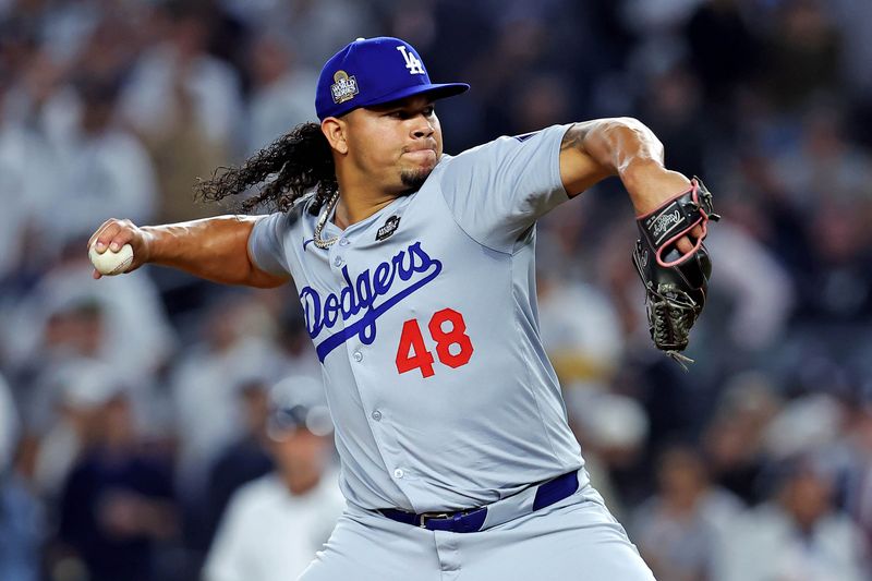 Oct 30, 2024; New York, New York, USA; Los Angeles Dodgers pitcher Brusdar Graterol (48) pitches during the sixth inning against the New York Yankees in game four of the 2024 MLB World Series at Yankee Stadium. Mandatory Credit: Brad Penner-Imagn Images