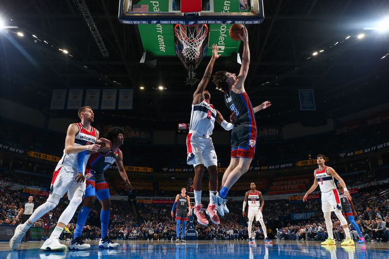 OKLAHOMA CITY, OK - JANUARY 6:  Josh Giddey #3 of the Oklahoma City Thunder drives to the basket during the game against the Washington Wizards on January 6, 2023 at Paycom Arena in Oklahoma City, Oklahoma. NOTE TO USER: User expressly acknowledges and agrees that, by downloading and or using this photograph, User is consenting to the terms and conditions of the Getty Images License Agreement. Mandatory Copyright Notice: Copyright 2023 NBAE (Photo by Zach Beeker/NBAE via Getty Images)