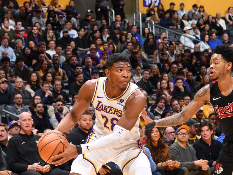 LOS ANGELES, CA - JANUARY 21:  Rui Hachimura #28 of the Los Angeles Lakers handles the ball during the game  on January 21, 2024 at Crypto.Com Arena in Los Angeles, California. NOTE TO USER: User expressly acknowledges and agrees that, by downloading and/or using this Photograph, user is consenting to the terms and conditions of the Getty Images License Agreement. Mandatory Copyright Notice: Copyright 2024 NBAE (Photo by Juan Ocampo/NBAE via Getty Images)