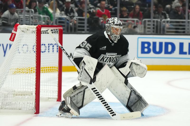 Nov 2, 2024; Los Angeles, California, USA; LA Kings goaltender Darcy Kuemper (35) defends the goal against the Chicago Blackhawks in the first period at Crypto.com Arena. Mandatory Credit: Kirby Lee-Imagn Images