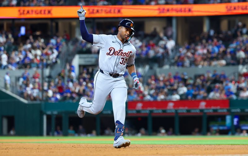 Jun 5, 2024; Arlington, Texas, USA;  Detroit Tigers designated hitter Justyn-Henry Malloy (36) reacts after hitting a home run during the sixth inning against the Texas Rangers at Globe Life Field. Mandatory Credit: Kevin Jairaj-USA TODAY Sports