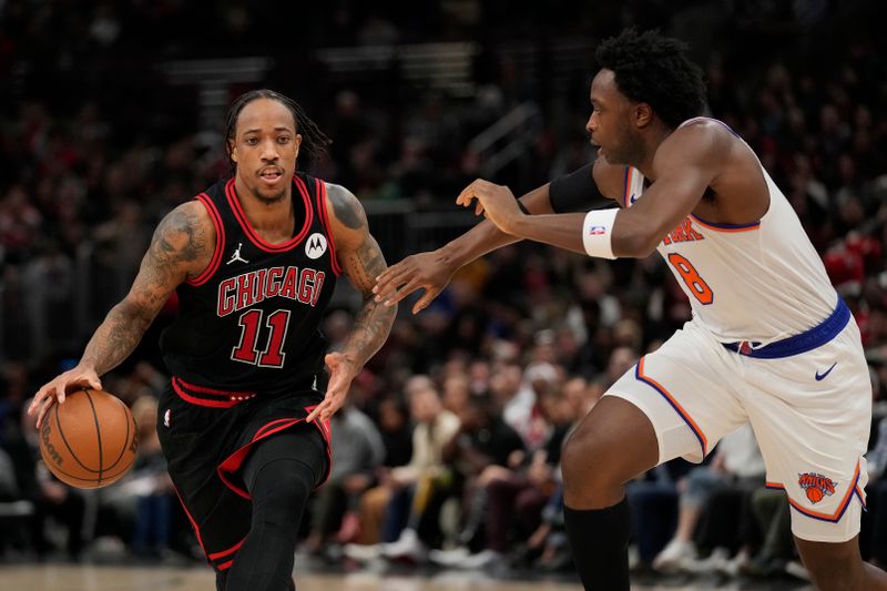 CHICAGO, ILLINOIS - APRIL 05: DeMar DeRozan #11 of the Chicago Bulls dribbles the ball against OG Anunoby #8 of the New York Knicks during the second half at the United Center on April 05, 2024 in Chicago, Illinois. NOTE TO USER: User expressly acknowledges and agrees that, by downloading and or using this photograph, User is consenting to the terms and conditions of the Getty Images License Agreement. (Photo by Patrick McDermott/Getty Images)