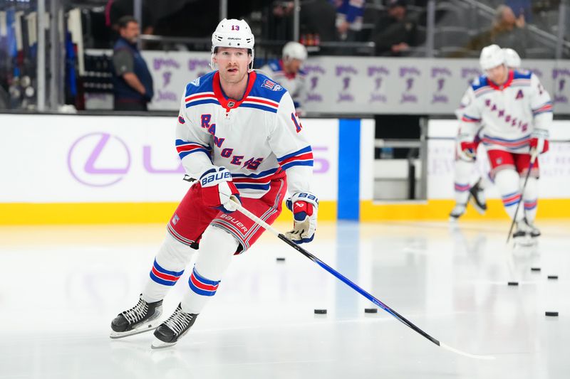 Nov 18, 2025; Las Vegas, Nevada, USA; New York Rangers left wing Alexis Lafrenière (13) warms up before a game against the Vegas Golden Knights at T-Mobile Arena. Mandatory Credit: Stephen R. Sylvanie-Imagn Images