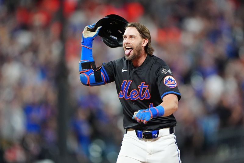 Jul 25, 2024; New York City, New York, USA; New York Mets left fielder Jeff McNeil (1) reacts to getting the game winning hit against the Atlanta Braves during the tenth inning at Citi Field. Mandatory Credit: Gregory Fisher-USA TODAY Sports