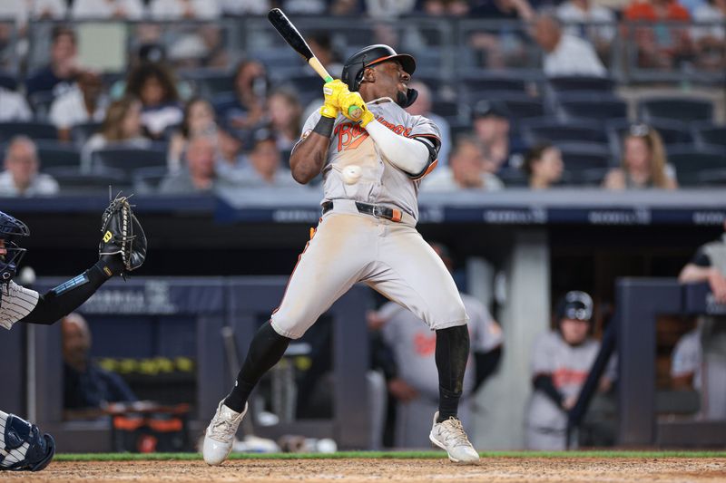 Jun 18, 2024; Bronx, New York, USA; Baltimore Orioles second baseman Jorge Mateo (3) avoids being hit by a pitch during the ninth inning against the New York Yankees at Yankee Stadium. Mandatory Credit: Vincent Carchietta-USA TODAY Sports