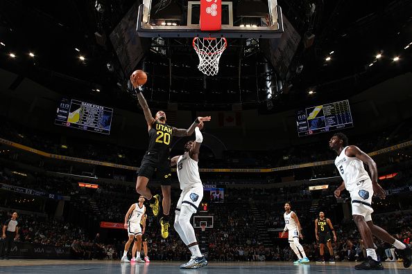 MEMPHIS, TN - NOVEMBER 29:  John Collins #20 of the Utah Jazz goes to the basket during the game on November 29, 2023 at FedExForum in Memphis, Tennessee. NOTE TO USER: User expressly acknowledges and agrees that, by downloading and or using this photograph, User is consenting to the terms and conditions of the Getty Images License Agreement. Mandatory Copyright Notice: Copyright 2023 NBAE (Photo by Joe Murphy/NBAE via Getty Images)