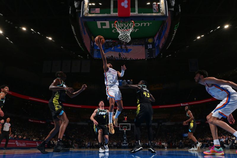 OKLAHOMA CITY, OK - MARCH 12: Aaron Wiggins #21 of the Oklahoma City Thunder drives to the basket during the game against the Indiana Pacers on March 12, 2024 at Paycom Arena in Oklahoma City, Oklahoma. NOTE TO USER: User expressly acknowledges and agrees that, by downloading and or using this photograph, User is consenting to the terms and conditions of the Getty Images License Agreement. Mandatory Copyright Notice: Copyright 2024 NBAE (Photo by Zach Beeker/NBAE via Getty Images)