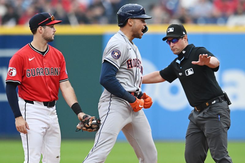 Jun 8, 2025; Cleveland, Ohio, USA; Houston Astros right fielder Cam Smith (11) celebrates after hitting an RBI double during the seventh inning against the Cleveland Guardians at Progressive Field. Mandatory Credit: Ken Blaze-Imagn Images