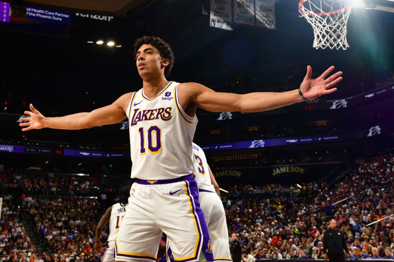 PHOENIX, AZ - FEBRUARY 25: Max Christie #10 of the Los Angeles Lakers plays defense against the Phoenix Suns on February 25, 2024 at Footprint Center in Phoenix, Arizona. NOTE TO USER: User expressly acknowledges and agrees that, by downloading and or using this photograph, user is consenting to the terms and conditions of the Getty Images License Agreement. Mandatory Copyright Notice: Copyright 2024 NBAE (Photo by Kate Frese/NBAE via Getty Images)