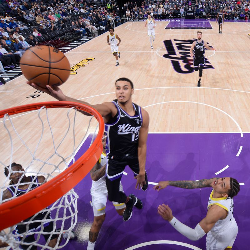 SACRAMENTO, CA - MARCH 31: Keegan Murray #13 of the Sacramento Kings drives to the basket during the game against the Utah Jazz on March 31, 2024 at Golden 1 Center in Sacramento, California. NOTE TO USER: User expressly acknowledges and agrees that, by downloading and or using this Photograph, user is consenting to the terms and conditions of the Getty Images License Agreement. Mandatory Copyright Notice: Copyright 2024 NBAE (Photo by Rocky Widner/NBAE via Getty Images)