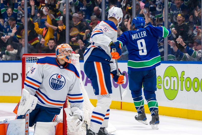 May 8, 2024; Vancouver, British Columbia, CAN; Edmonton Oilers defenseman Darnell Nurse (25) and goalie Stuart Skinner (74) react as Vancouver Canucks forward J.T. Miller (9) celebrates his goal during the third period in game one of the second round of the 2024 Stanley Cup Playoffs at Rogers Arena. Mandatory Credit: Bob Frid-USA TODAY Sports