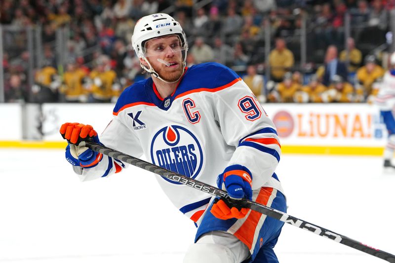 Dec 3, 2024; Las Vegas, Nevada, USA; Edmonton Oilers center Connor McDavid (97) skates against the Vegas Golden Knights during the first period at T-Mobile Arena. Mandatory Credit: Stephen R. Sylvanie-Imagn Images