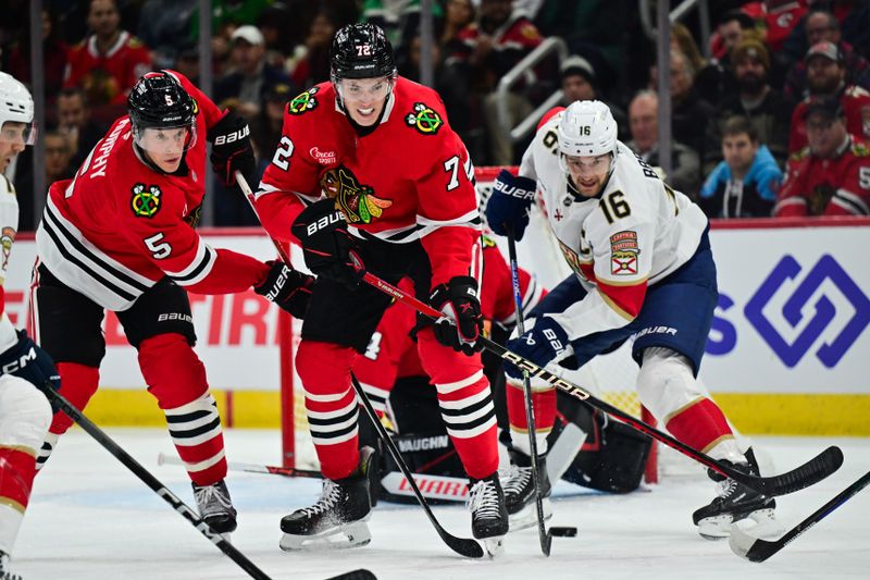 Nov 21, 2024; Chicago, Illinois, USA; Chicago Blackhawks defenseman Connor Murphy (5) and defenseman Alex Vlasic (72) battle with Florida Panthers center Aleksander Barkov (16) during the first period at the United Center. Mandatory Credit: Daniel Bartel-Imagn Images