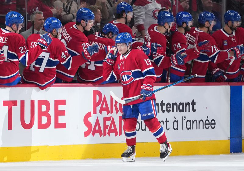 Jan 22, 2026; Montreal, Quebec, CAN; Montreal Canadiens forward Cole Caufield (13) celebrates with teammates after scoring a goal against the Buffalo Sabres during the second period at the Bell Centre. Mandatory Credit: Eric Bolte-Imagn Images