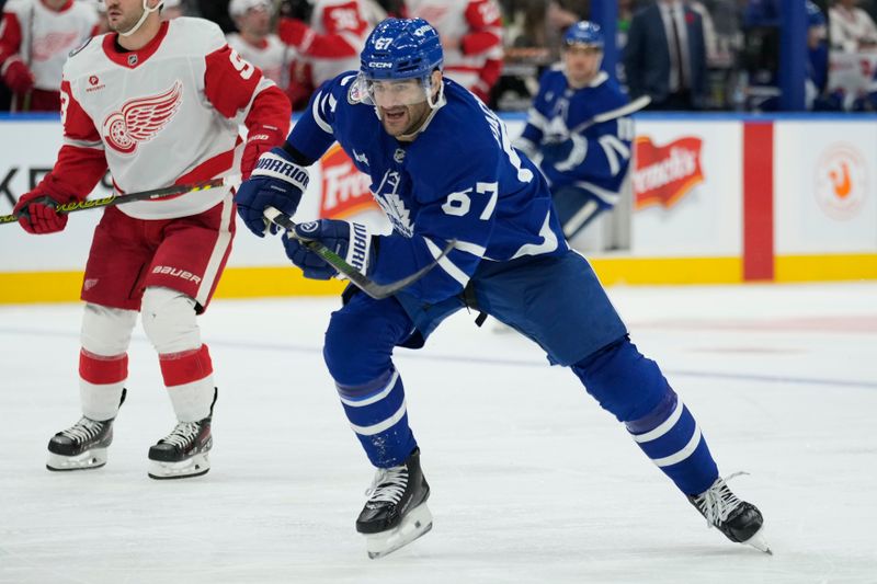 Nov 8, 2024; Toronto, Ontario, CAN; Toronto Maple Leafs forward Max Pacioretty (67) skates against the Detroit Red Wings during the third period at Scotiabank Arena. Mandatory Credit: John E. Sokolowski-Imagn Images