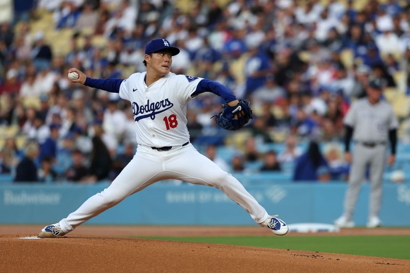 Jun 1, 2024; Los Angeles, California, USA;  Los Angeles Dodgers starting pitcher Yoshinobu Yamamoto (18) pitches during the first inning against the Colorado Rockies at Dodger Stadium. Mandatory Credit: Kiyoshi Mio-USA TODAY Sports