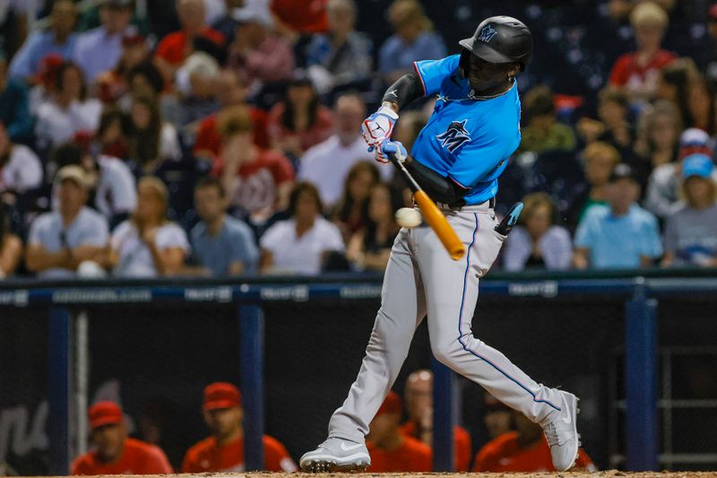 Mar 10, 2023; West Palm Beach, Florida, USA; Miami Marlins center fielder Jazz Chisholm Jr. (2) hits a double during the fourth inning against the Washington Nationals at The Ballpark of the Palm Beaches. Mandatory Credit: Sam Navarro-USA TODAY Sports