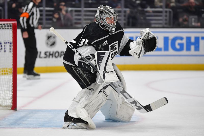 Mar 11, 2024; Los Angeles, California, USA; Los Angeles Kings goaltender David Rittich (31) defends the goal against the New York Islanders during the first period at Crypto.com Arena. Mandatory Credit: Gary A. Vasquez-USA TODAY Sports